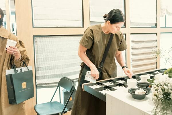 Tanga Winstead looking through samples