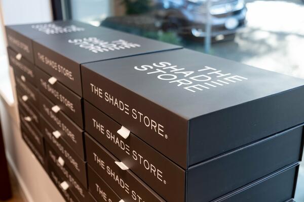 Stacks of The Shade Store’s trade library kits