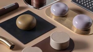 Faucets showers campaign foundry groove pebble metal finishes composition